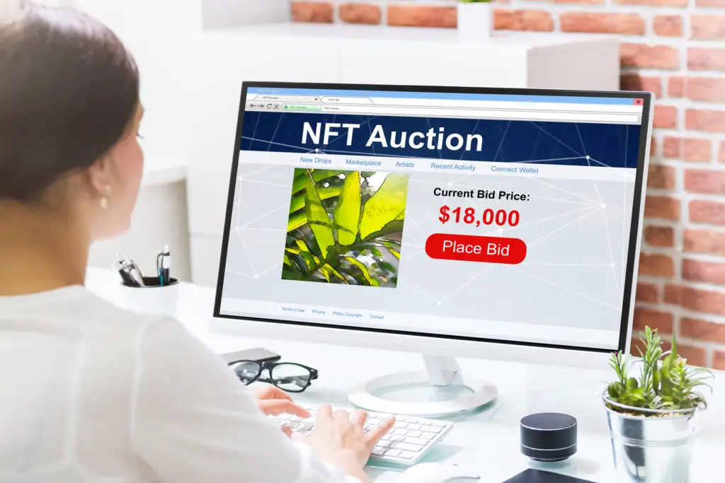 Woman browsing NFT Auction.