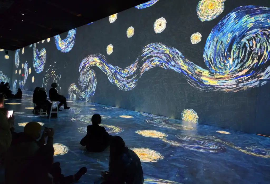 People at digital art exhibition of Starry Night